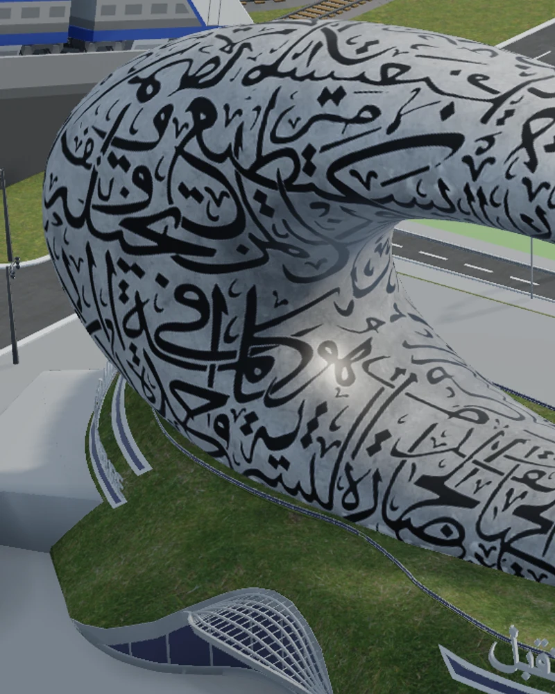 Calligraphic details curving around part of a silver landmark building.